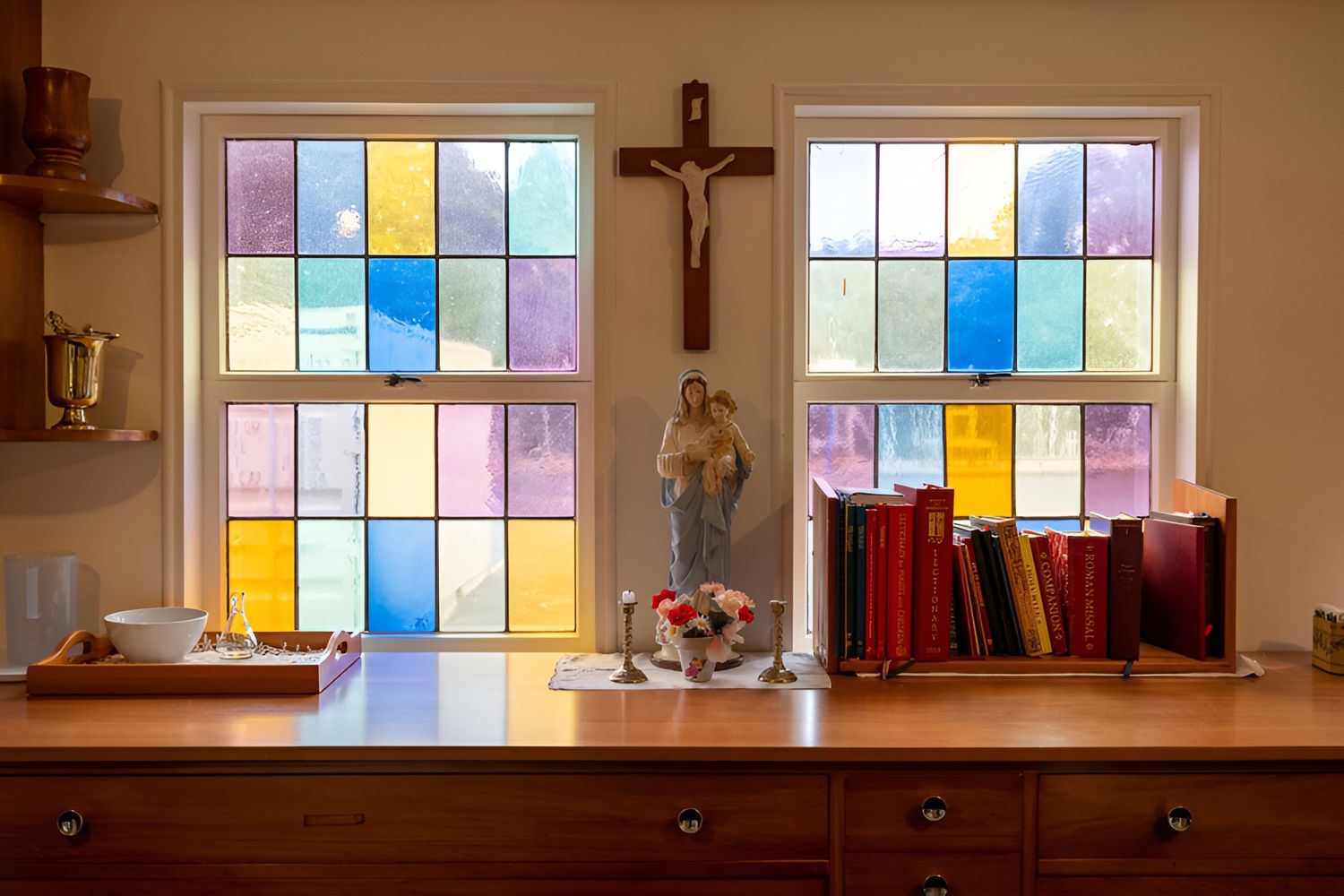 Sanctuary of St Joseph's Church with stained glass and crucifix